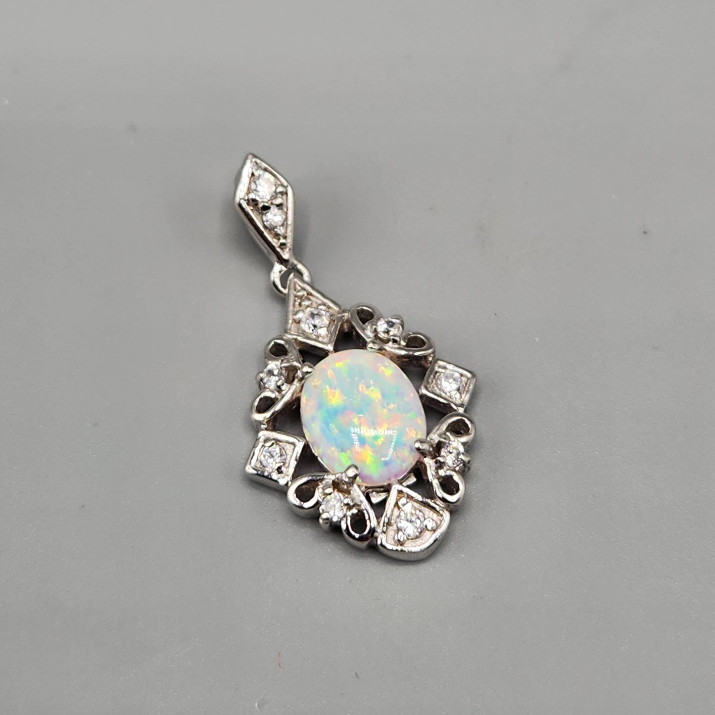 Silver Cubic Zirconia Pendant with Center Opal