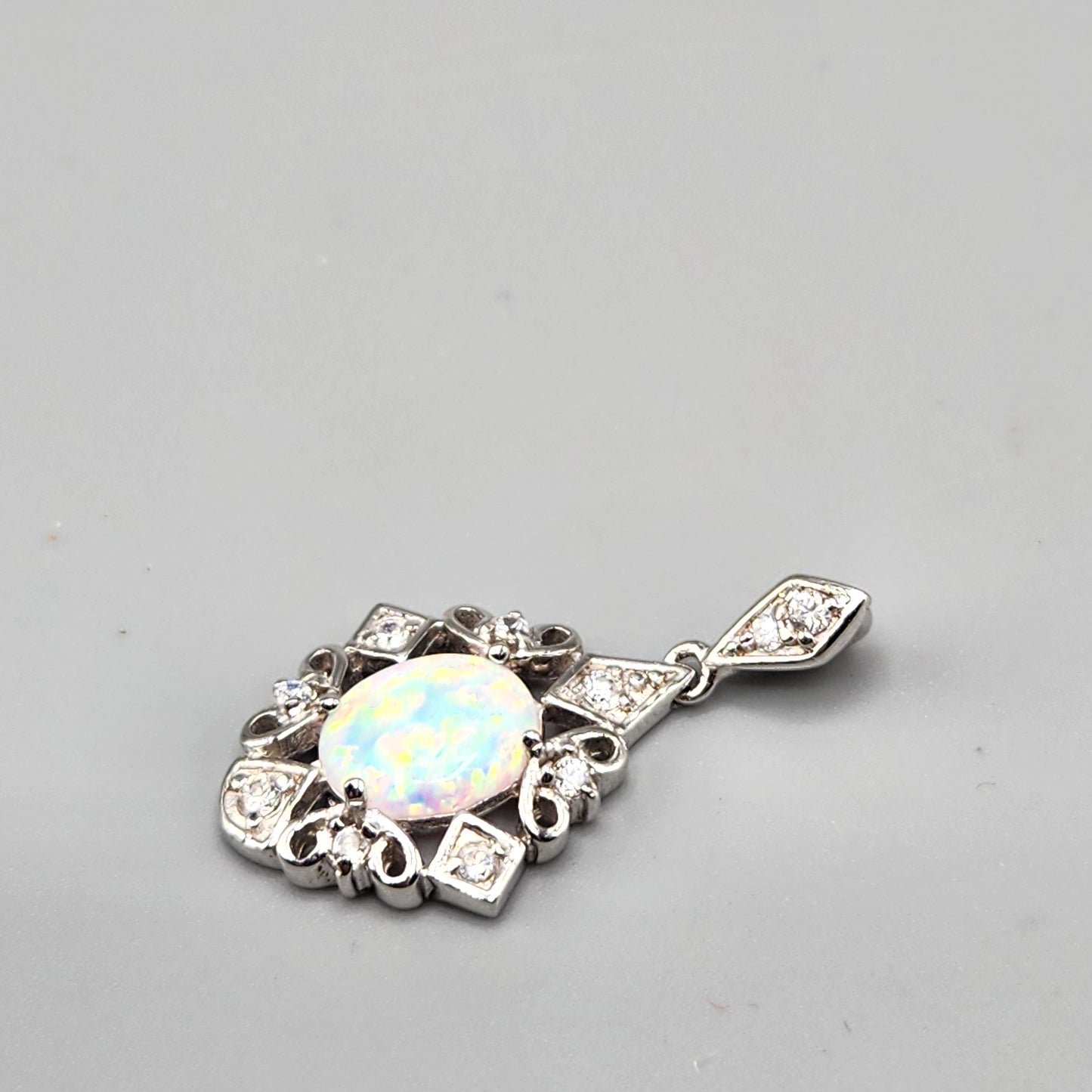 Silver Cubic Zirconia Pendant with Center Opal