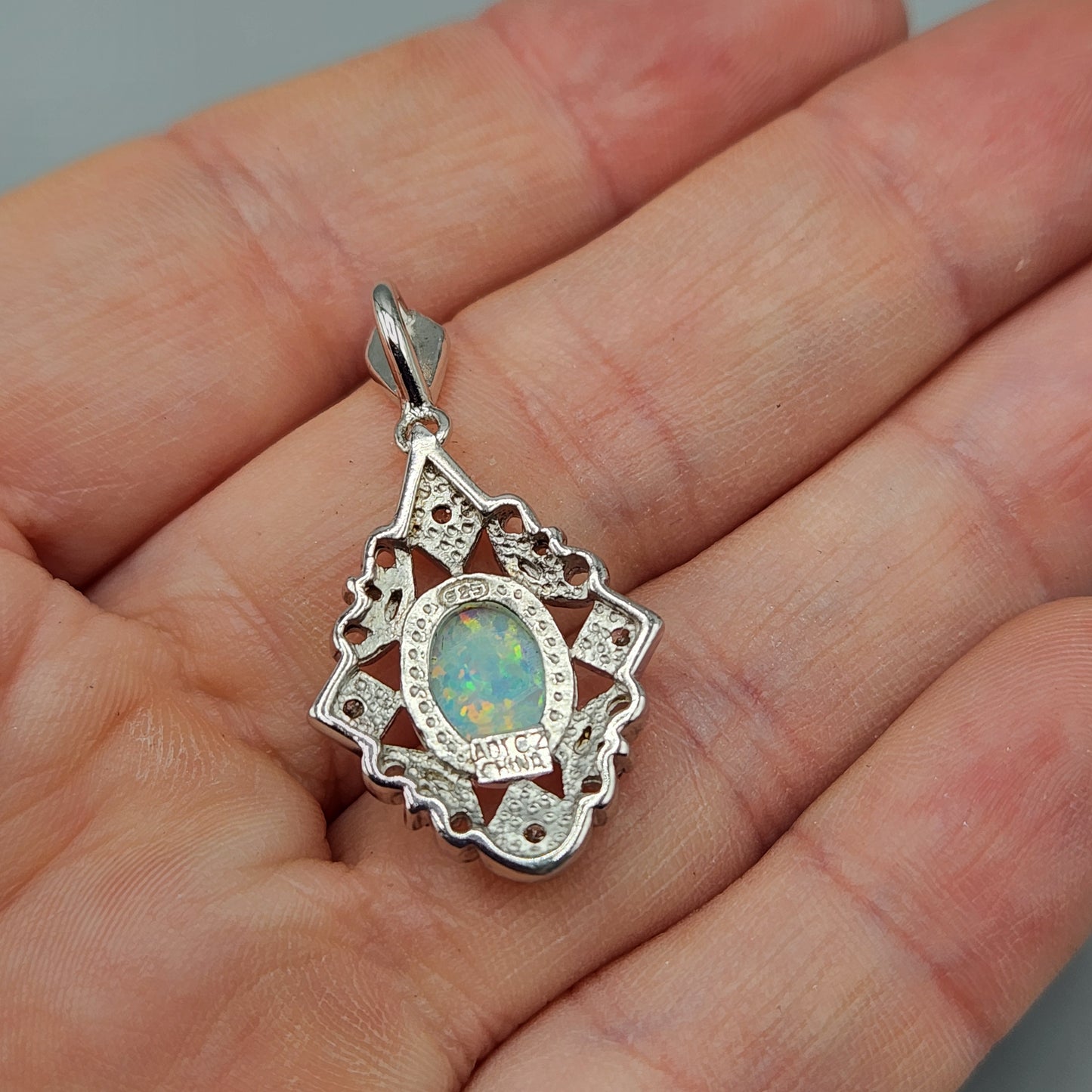 Silver Cubic Zirconia Pendant with Center Opal